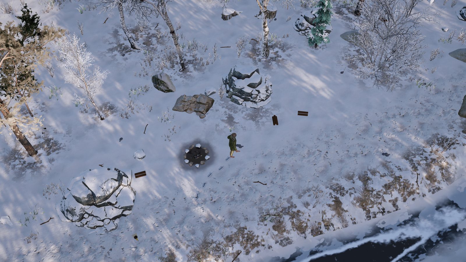 Top-down view at noon on a clear day: the survivor in a parka beside a cold fire ring, boulders and birches behind him and the frozen creek in the corner.